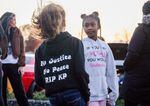 A girl wears a sweatshirt honoring Kevin Peterson Jr. on Oct. 29, 2021. On the anniversary of Peterson's death, his family visited the site where a regional drug task force shot and killed him during an attempted drug sting.