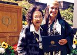 In this 2014 photo, Emmilee Risling (right) poses at her University of Oregon graduation ceremony with her great-aunt and adoptive grandmother, Viola Risling-Ryerson.