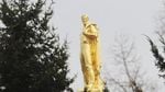 The Oregon Pioneer, or "Gold Man," stands atop the Oregon Capitol in Salem.