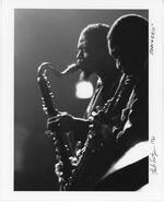 A photograph of Eric Dolphy (left) and John Coltrane taken by Herb Snitzer during a performance at the Village Gate in New York in 1961.