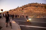 Protestors block a crossing of Hwy 20 in Bend for about two and a half minutes on Oct. 4, 2020. Police did not respond to the incident, and later recommended charging seven people in connection to it. 