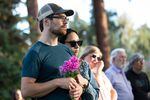 Craig Van Bruggen and Charlene Chew attend a community vigil at Drake Park in Bend, Ore., Monday, Aug. 29, 2022, following an attack on a Bend shopping center.