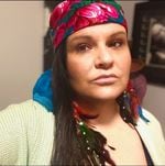 Brandi Morin, from the Cree Nation of Alberta, Canada, says she wears a scarf in support of Ukraine.