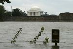 The overflowing Tidal Basin covers a walkway across from the Jefferson Memorial in Washington Friday, Sept. 19, 2003, in the aftermath of Hurricane Isabel.