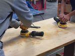 Students use power sanders in the Sunridge Middle School wood shop, in Pendleton.