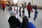 Elders watch young dancers in a mini powwow at the Warm Springs Agency longhouse on March 12, 2020. 