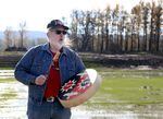 Sam Robinson, vice chairman of the Chinook Indian Tribe, sings a song about the changes taking place during a massive wetland restoration project at the Steigerwald National Wildlife Refuge in Washougal, Wash.