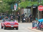 Belongings were left behind at the scene of a mass shooting along the route of a parade in Highland Park, Illinois on Monday.