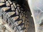 This time of year, Herron’s tires are usually caked in mud from the wet roads. Instead, they’re dusty. 