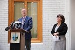 Portland Mayor Ted Wheeler and Commissioner Chloe Eudaly at a press conference unveiling a phone app meant to streamline the house hunting process for renters in Portland.