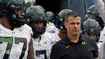 Oregon head coach Mario Cristobal prepares to enter the field with his team during an NCAA college football game against UCLA on Saturday, Oct. 23, 2021, in Pasadena.