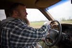 Fourth-generation farmer Matthew Cook drives through his family's farm in Albany, Ore., on Jan. 22, 2020. NORPAC's bankruptcy left him with a host of questions about how to plan for the future.