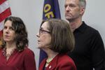 Local and state leaders, including Oregon Gov. Kate Brown, Portland Mayor Ted Wheeler and Multnomah County Chair Deborah Kafoury, gather at a news conference Thursday, March 12, 2020, to discuss statewide efforts to stem the spread of novel coronavirus.