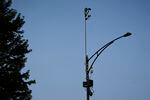 ShotSpotter equipment overlooks the intersection of South Stony Island Avenue and East 63rd Street on Tuesday, Aug. 10, 2021, in Chicago, where a lawsuit filed in federal court alleges that Chicago police misused the company's “unreliable” gunshot detection technology.