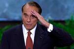 FILE - In this Aug. 1, 2000, file photo, former senator and former presidential candidate Bob Dole salutes after a speech at the Republican National Convention in the First Union Center in Philadelphia. Bob Dole, who overcame disabling war wounds to become a sharp-tongued Senate leader from Kansas, a Republican presidential candidate and then a symbol and celebrant of his dwindling generation of World War II veterans, has died. He was 98. His wife, Elizabeth Dole, posted the announcement Sunday, Dec. 5, 2021, on Twitter.