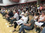 More than 500 people gathered at a community meeting at Glendale High School in Douglas County, Ore., to discuss the Milepost 97 fire, Sunday, July 28, 2019.