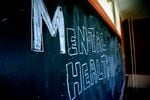 Mental Health is written across a chalkboard.