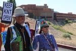 Sam Starr and Jo Ann Smith march in front of the Kah-Nee-Ta lodge to the hot springs down the hill as part of a protest over the possible closure of the resort.