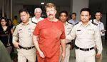 Russian arms dealer Viktor Bout is shown in custody in Bangkok, Thailand, in 2008. Bout was later extradited to the U.S. and convicted of conspiring to kill Americans. He's serving a 25-year sentence, but he may be part of a prisoner swap the U.S. and Russia are trying to negotiate.