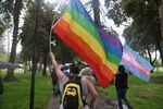 Members and supporters of the LGBTQ community march during the Pride in the Park event in Coeur d'Alene, Idaho, on Saturday. Law enforcement said members of a far-right group were arrested for planning to riot near the march.