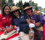 Past presidents Teri Bowles Atherton and Leslie Goodlow, and Clown Prince Angel Ocasio (left to right) pictured in 2019 at the Portland Rose Festival's Junior Parade.