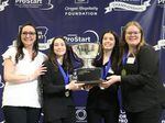 Students from McMinnville High School hold up their winning trophy at the Oregon ProStart Championships in Salem, March 13, 2023. The group won the management competition with their business concept for Twisted Taco.