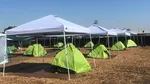 25 tents are lined up in the urban campground in Medford.