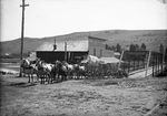 This image taken by Maud Baldwin, circa 1900s, shows a horse freight team crossing the Link River in front of the Baldwin Store.