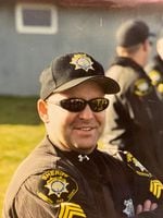 A picture of Douglas Diamond in his Washington County Sheriff's Office uniform.
