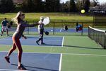Real estate agent Lene Wells plays a game of pickleball at the Tanner Creek Park courts on Feb. 10, 2023. 