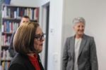 Oregon Gov. Kate Brown (left, foreground) was among the state and local officials on hand to tour Oregon State University-Cascades and celebrate funding for a new building, in April 2018. She was joined by vice president Becky Johnson (right, background).