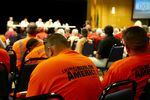 Supporters of the oil terminal project included local labor unions, who wore orange T-shirts at the hearing. Opponents of the project dressed in red.