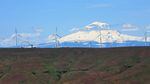 Wind turbines, with Mount Adams in the backdrop. A new report from Stanford researchers says it won't pencil out to store surplus wind power in grid-scale batteries.