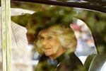 Camilla, the Queen Consort, sits in a car before attending the State Funeral Service of Britain's Queen Elizabeth II.