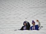 Buffalo Bills fans braved chilly temperatures to sit in snow-covered seats during an NFL game in Orchard Park, N.Y., on Saturday.