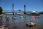 The 8th Big Float event, taking place in front of the Hawthorne Bridge at the Tom McCall Waterfront Park in downtown Portland, Ore., is hosted by the Human Access Project to encourage people to swim in the Willamette River. 