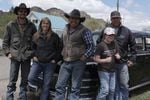 Mark Fillmore (center) hangs out with some friends the day before the Big Loop Rodeo begins in Jordan Valley.