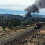 Train derailment fire as seen from Coyote Wall area on Washington state Route 14.