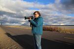 Susan Doverspike stops the truck to photograph birds near her family's cattle ranch near Burns. 
