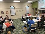 People spoke out for and against the library dissolution at a library Board of Trustees meeting Aug. 21, 2023.