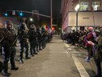 Portland protesters stood at a police line following property damage on Wednesday, Nov. 4, 2020. The demonstration ensued as votes were counted nationwide, and the results of the presidential election remained undeclared.