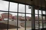 A view of the main Franklin High School building through the windows of the new athletic center. Franklin was rebuilt under Portland Public Schools' 2012 construction bond. 