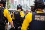 Portland police officers on bicycles at a Proud Boys rally in Portland, Ore., Saturday, Aug. 17, 2019.