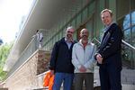 From left, Ron Blaj, Dan Zalkow and Jason Franklin - three of the leaders of Portland State University's campus overhaul - stand in front of the new Peter Stott Center in April 2018.