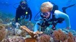 2010, NOAA chief Jane Lubchenco participating in coral restoration in Florida.