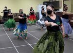 Students in the adult class at Hālau Hula O Nā Pua O Hawai'i Nei hula school practice for an upcoming performance.