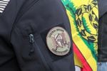 A militia patch on the arm of a protester in Burns, Oregon.