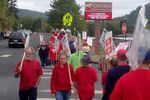 Teachers, parents and students protested in Kelso, Wash. on Monday outside Kelso High School.
