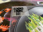 Two 45 rpm vinyl picture discs, with silver "Record Store Day Exclusive" stickers