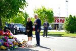 President Joe Biden and first lady Jill Biden visit the scene of a shooting at a Buffalo supermarket to pay respects.